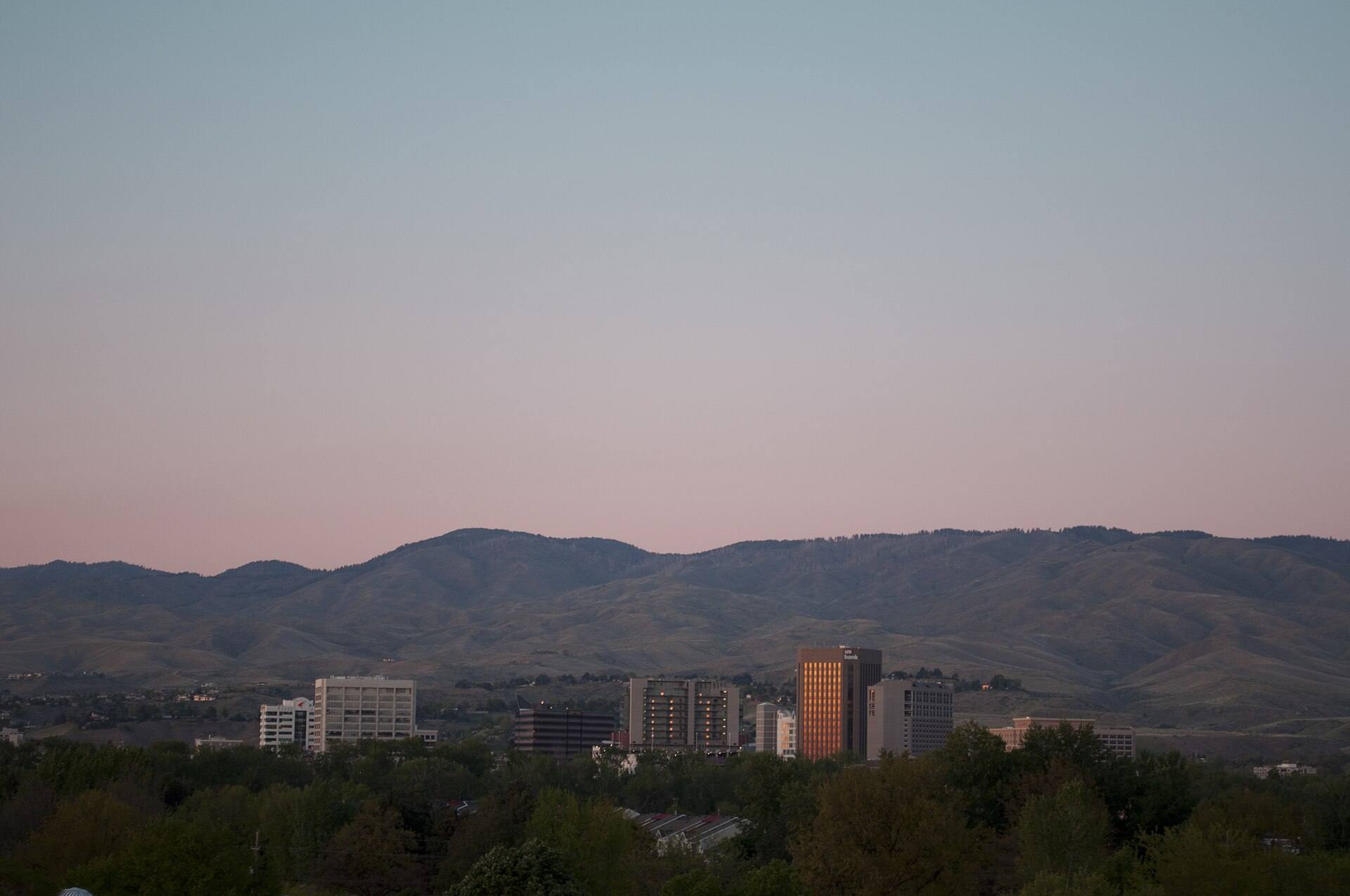 Downtown Boise and the foothills at dusk.